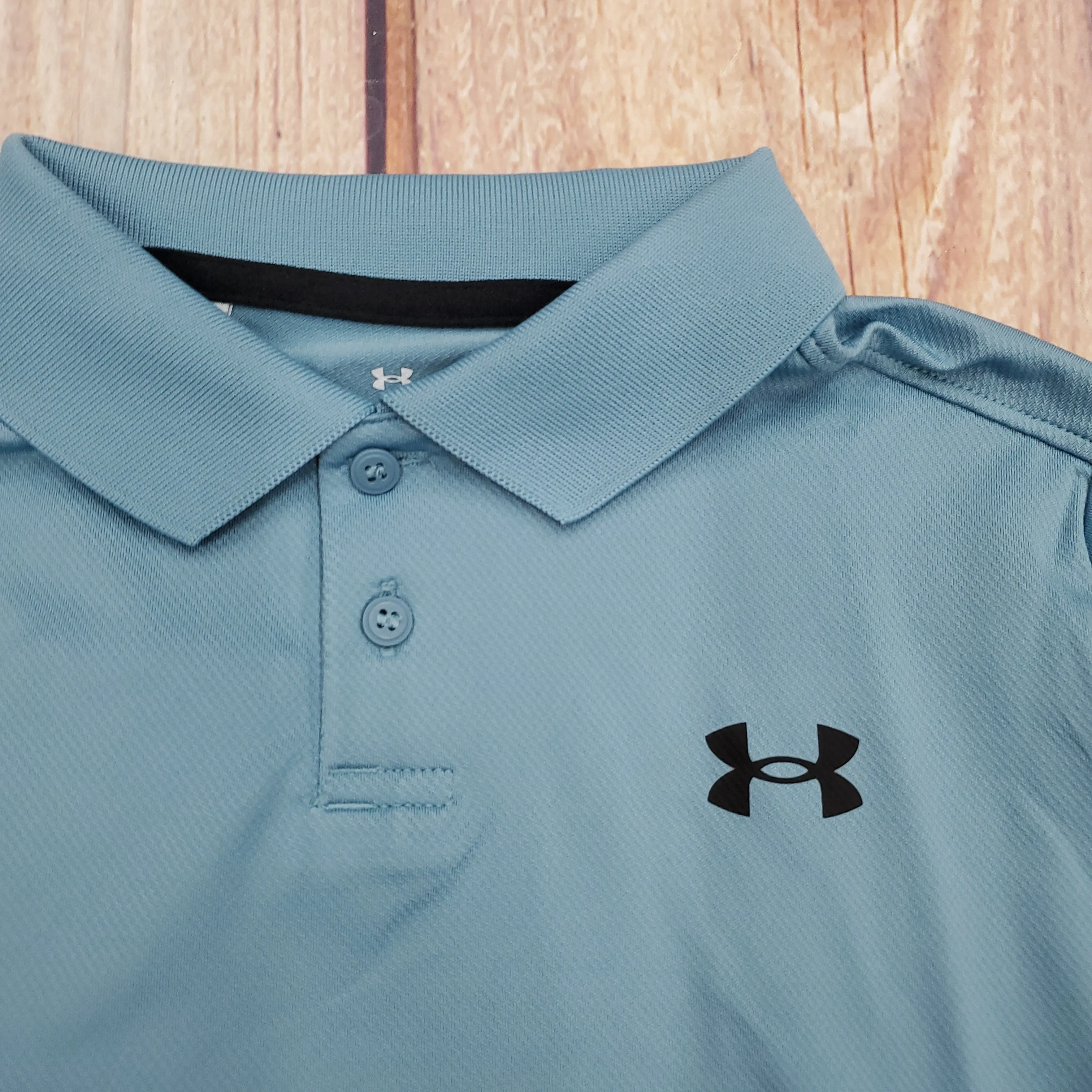 UA PERFORMANCE POLO